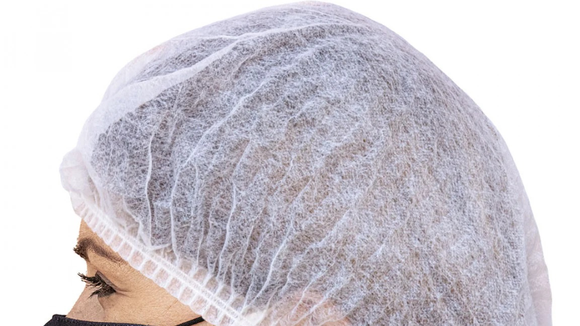 Design plissettato che garantisce copertura completa dei capelli.