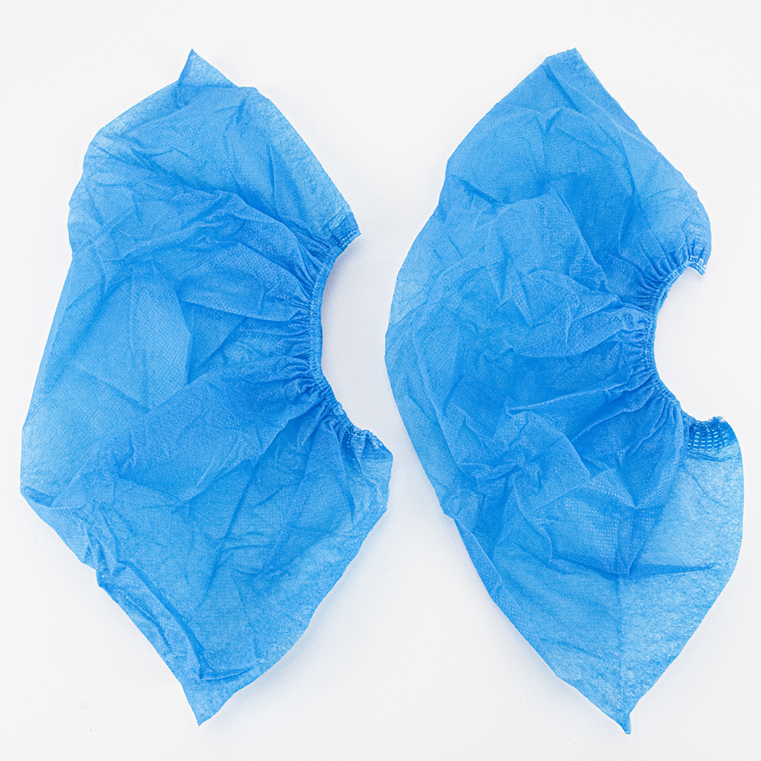 Copriscarpe blu professionali per ambienti igienici e sanitari.